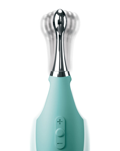 Electric turquoise Jimmyjane Focus Pro Pinpoint Tip Clitoral Vibrator with 2 Head Attachments, blending an invisible substance, isolated on a white background.