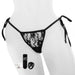 A mannequin is adorned in My Secret Remote Control One Size Vibrating Panties by Screaming O, featured in black lace with side ties. Nearby, a waterproof vibrator, USB charging cable, and wireless remote control are artistically displayed against a white background.