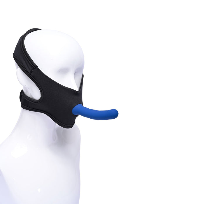 A white mannequin head showcases the Sportsheets Pivot Face Sitting Strap On Harness, featuring a black head strap with an attached blue protrusion extending from the front that resembles a strap-on nose or an elongated mouthpiece. The background is white.