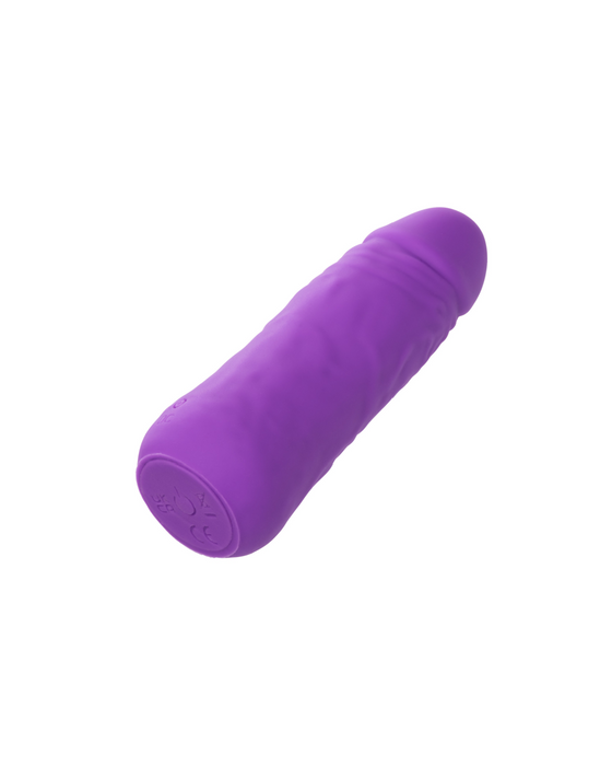 This compact, cylindrical purple vibrator, the Vibrating Stud Mini Cock Shaped Bullet Vibrator - Purple by CalExotics, is crafted from premium silicone with a smooth texture and subtle ridges along the shaft. Battery-operated with a flat base, it offers powerful speeds of vibration for an enhanced experience.