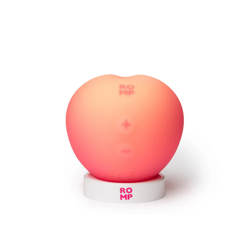 Romp Peach Pleasure Air Clitoris Stimulator, a compact, soft silicone peach-shaped toy in gradient peach-pink.