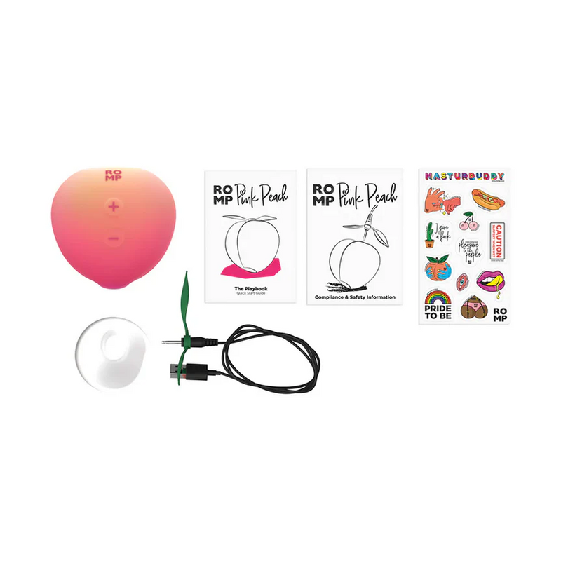 Romp Pink Peach Air Clitoris Stimulator, USB charger, and manuals.
