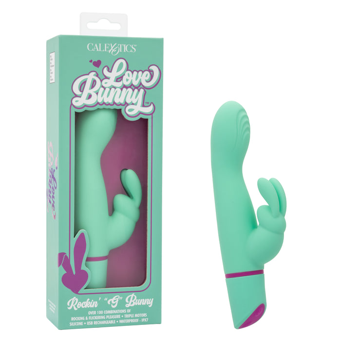 The Love Bunny Rockin’ G Triple Motor Rabbit Vibrator by CalExotics, shown in turquoise with a curved shaft and dual stimulation ears, appears beside its playful teal and purple "Love Bunny" box featuring stylish fonts and product details.