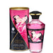 A bottle of Aphrodisiac Cherry Warming Oil for Erogenous Zones 100 ml sits beside its cylindrical packaging, both adorned with art of an embracing couple in traditional Japanese attire. This warming oil is safe for use with sex toys and enhances pleasure.
