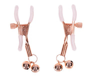 The Peaches 'n Cream Pearl Nipple Clamps with Bells are gold-colored, adjustable clamps with white silicone tips and small gold jingle bells, shown on a white background.