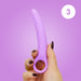 A hand with dark nail polish holds a Skins Care Curved Vaginal Dilator (Small/Medium, medical-grade silicone) from the 3-piece set against a purple background. A white circle with the number 3 is in the top right corner.