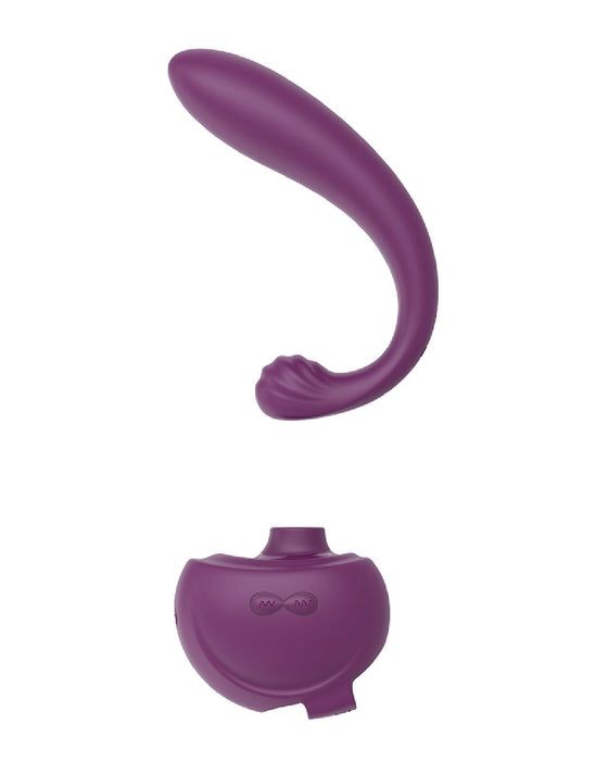 A curved purple waterproof Tracy's Dog OG 3 Clitoral Suction & G-Spot 2 in 1 Vibrator, possibly a wearable gadget with a remote control, designed for clitoral stimulation and displayed against a white background.