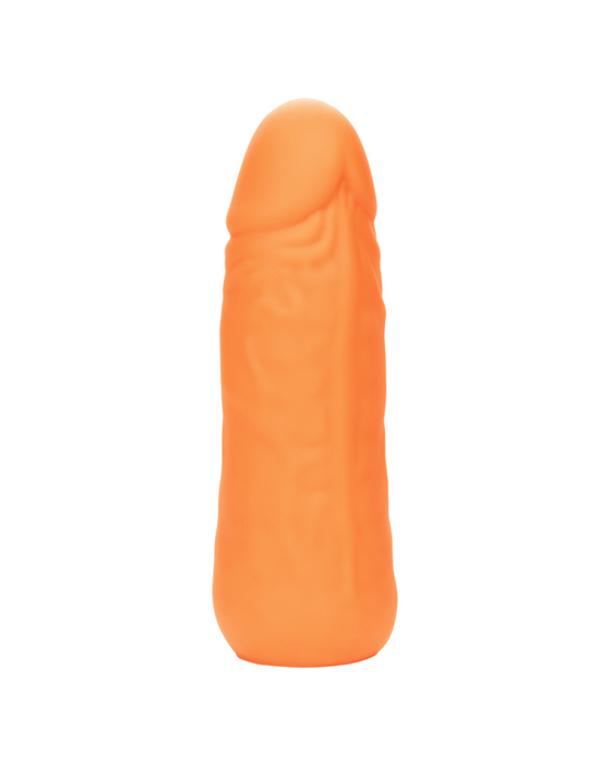 A close-up view of the Vibrating Stud Mini Cock Shaped Bullet Vibrator - Orange by CalExotics, featuring detailed ridges and textures, crafted from body-safe silicone.