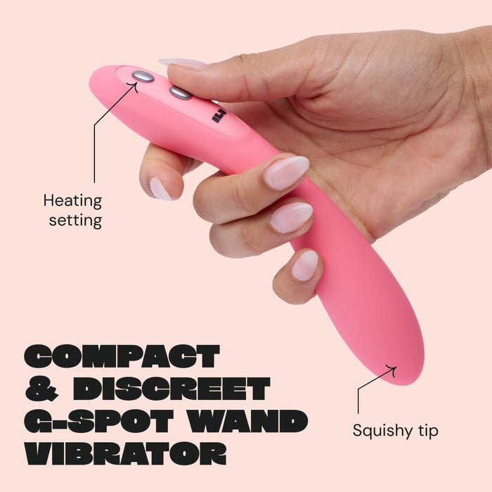 A hand holds the Ily Flexible Warming G-Spot Vibrator, pink and curved, showing its heating button and squishy tip. Bold text below reads, "Compact & Discreet Mini Wand G-Spot Vibrator.
