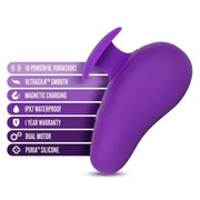 The Blush Wellness Palm Sense Rumbly External Vibrator with Finger Hold is showcased in a sleek, purple silicone design, highlighting features such as 10 powerful vibrations, UltraSilk™ smooth texture, magnetic charging capability, IPX7 waterproof rating, 1-year warranty, dual motor system, and construction from premium Puria™ silicone.