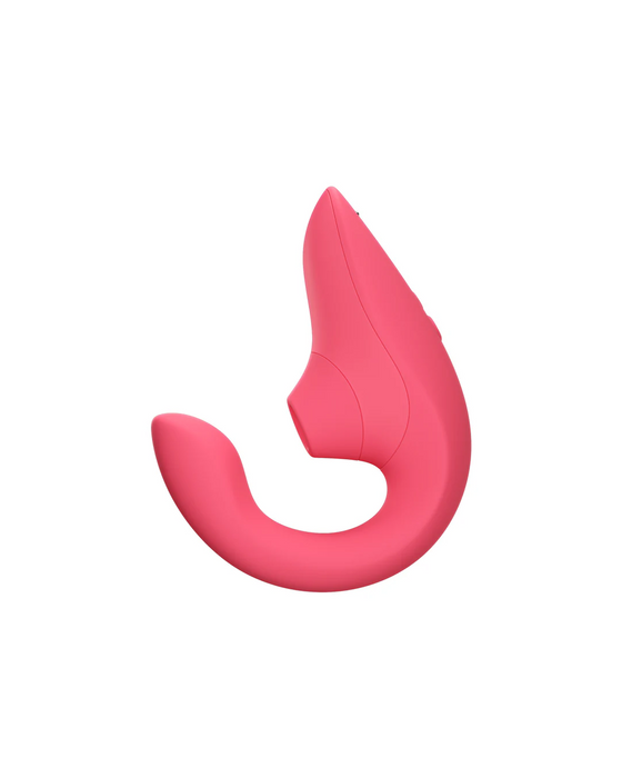 A modern, pink, U-shaped personal massager with a sleek, ergonomic design for dual stimulation. The Womanizer Blend Pleasure Air Clitoral & G-Spot Rabbit - Rose by Womanizer has a smooth texture and appears designed for comfort and ease of use.