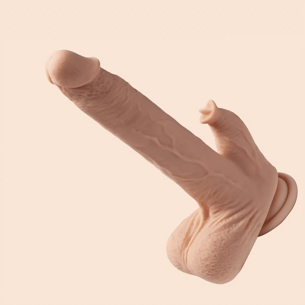 The Colter Thrusting Large 8.5" Realistic App Controlled Dildo with Clit Licker offers lifelike thrusting action and a clitoral stimulator, mimicking realistic sensations for enhanced pleasure.