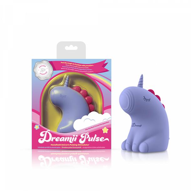A purple unicorn vibrator called "Dreamy Pulse – The Magical Unicorn Pulse Vibrator," made from body-safe silicone, sits by its pastel box decorated with clouds, stars, and a clear window displaying the product.
