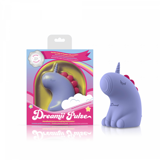 A purple unicorn vibrator called "Dreamy Pulse – The Magical Unicorn Pulse Vibrator," made from body-safe silicone, sits by its pastel box decorated with clouds, stars, and a clear window displaying the product.