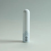 Sleek white Illumination Bullet LED vibrator with subtle wave texture and control buttons.
