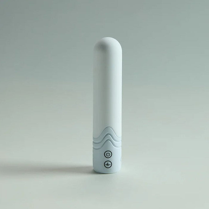 Sleek white Illumination Bullet LED vibrator with subtle wave texture and control buttons.