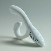 White Illumination Rabbit LED vibrator with a curved shaft and flexible stimulator, showing control buttons.