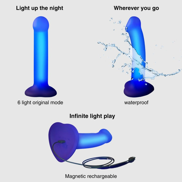 The Glow Blue LED 7 Inch Light Up Silicone Dildo is harness-compatible, glows in the dark, is waterproof when splashed, and features an easy magnetic charging cable for recharging.