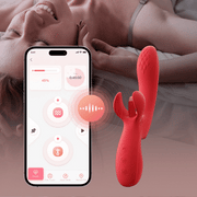 A woman smiles in bed as a smartphone displays an app beside the Fortexa Kinky Finger Rabbit Vibrator with App Control, hinting at personalized clitoral stimulation via phone.