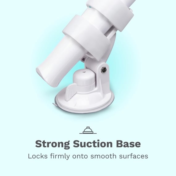 A close-up of the Le Wand Adjustable Hands-Free Vibrator Mount with Suction Cup locked onto a smooth surface. Text below reads: “Strong Suction Base - Locks firmly onto smooth surfaces.”.