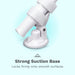 A close-up of the Le Wand Adjustable Hands-Free Vibrator Mount with Suction Cup locked onto a smooth surface. Text below reads: “Strong Suction Base - Locks firmly onto smooth surfaces.”.