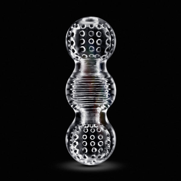 The Rize Feelz Clear Textured Stroker is a transparent, double-ended male masturbator with a central grip and textured, dimpled surfaces on both rounded ends, shown against a black background.