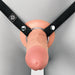 A person wearing the Fantasy X-Tensions Elite Hollow 5 Inch Silicone Dildo & Strap-On Harness in Vanilla.