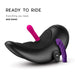 Introducing The Cowgirl Saddle Sex Machine with Vibration, Thrusting, and Rocking: features a ribbed pink top attachment, curved purple side attachment, and a small black remote. Ready to Ride—experience hands-free pleasure with everything you need and more!.